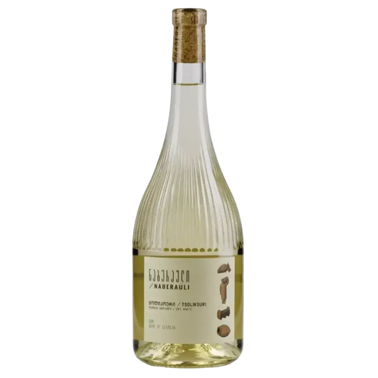 A bottle of Naberauli Tsolikouri 2023 white wine with an elegant ribbed glass design and a label featuring Georgian script and grape illustrations.